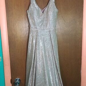 Selling old dresses that don’t fit anymore.